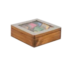 Caja de té Haras de 9 divisiones cerrada, con los saquitos de té a la vista bajo el vidrio de la tapa